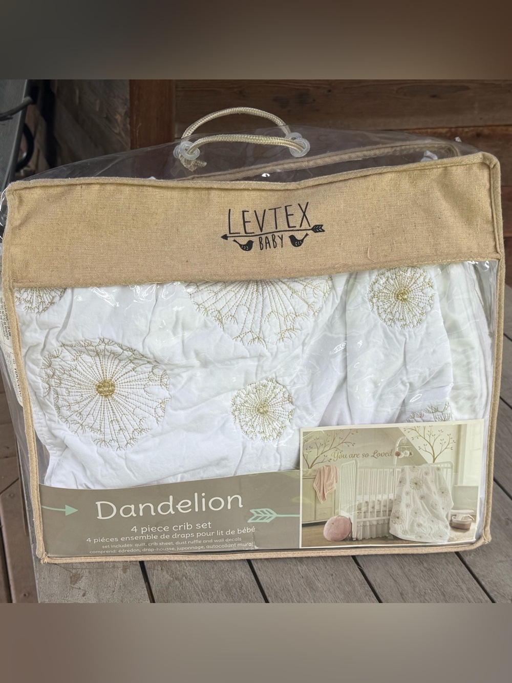 Levtex Baby Dandelion Crib Quilt in White and Gold. Quilt, sheet, dust ruffle et